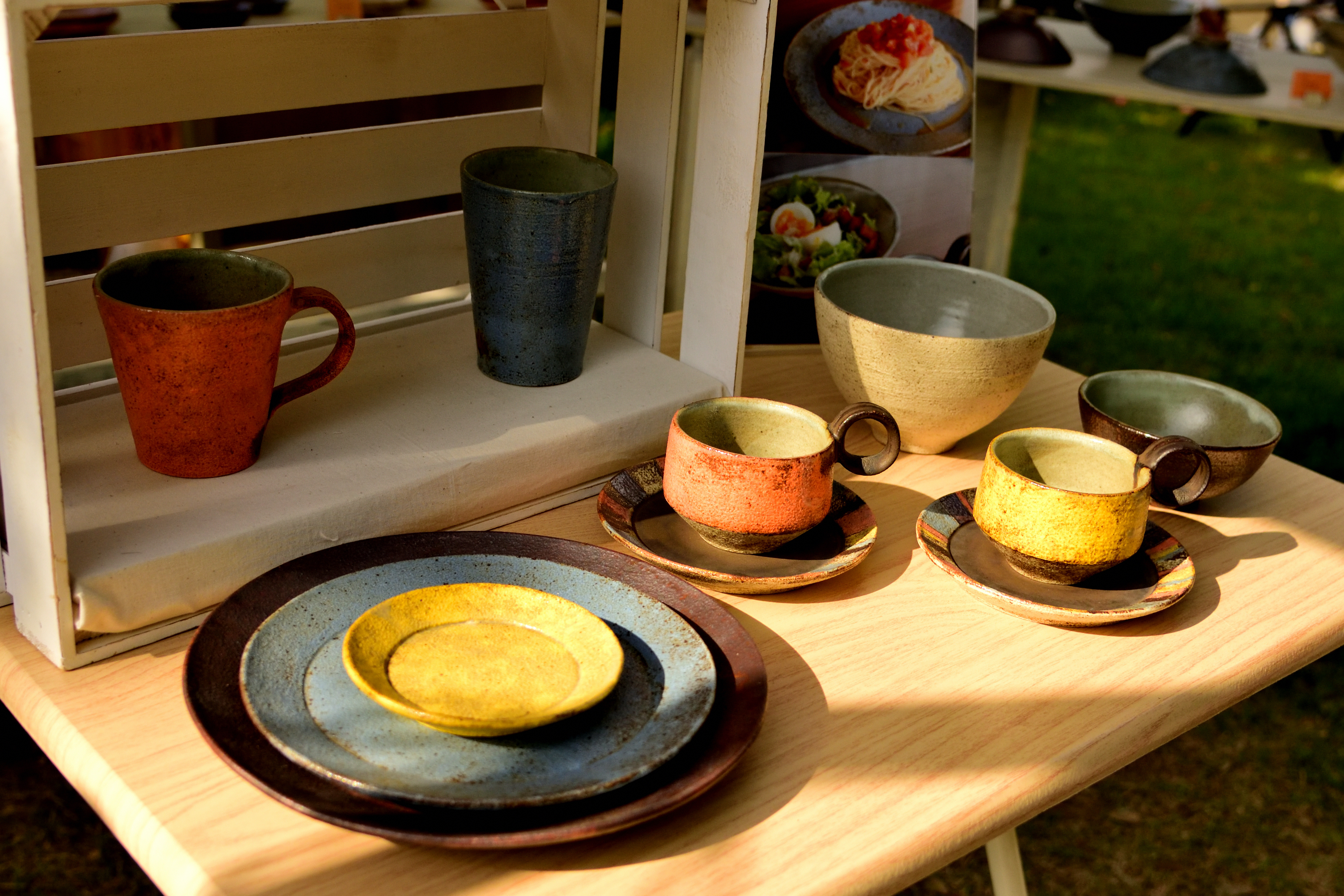 Wood desk and pottery plate in Craftfair Matsumoto